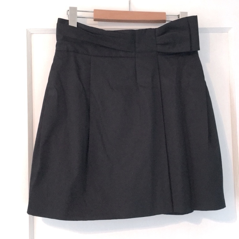 BCBG - black pleated skirt with bow embellishment